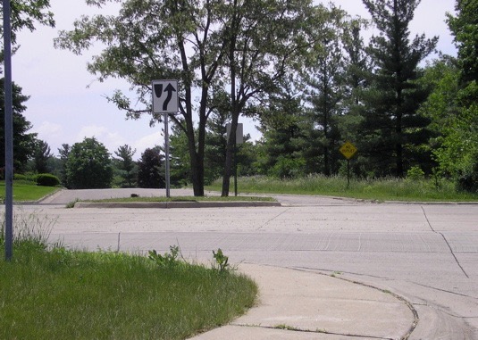 This is the entrance to Parkland Plaza: you are turning left on to it