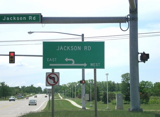 After getting off the highway at Zeeb road and heading south, you'll see this sign at Jackson road.  You want to go east, so turn right on Jackson and then make a U-turn right away (in front of Meijer).